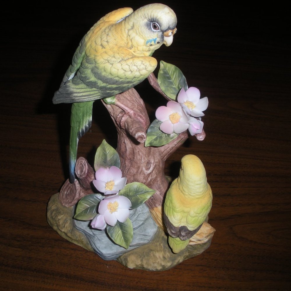 Yellow Parakeet with chick ceramic figurine